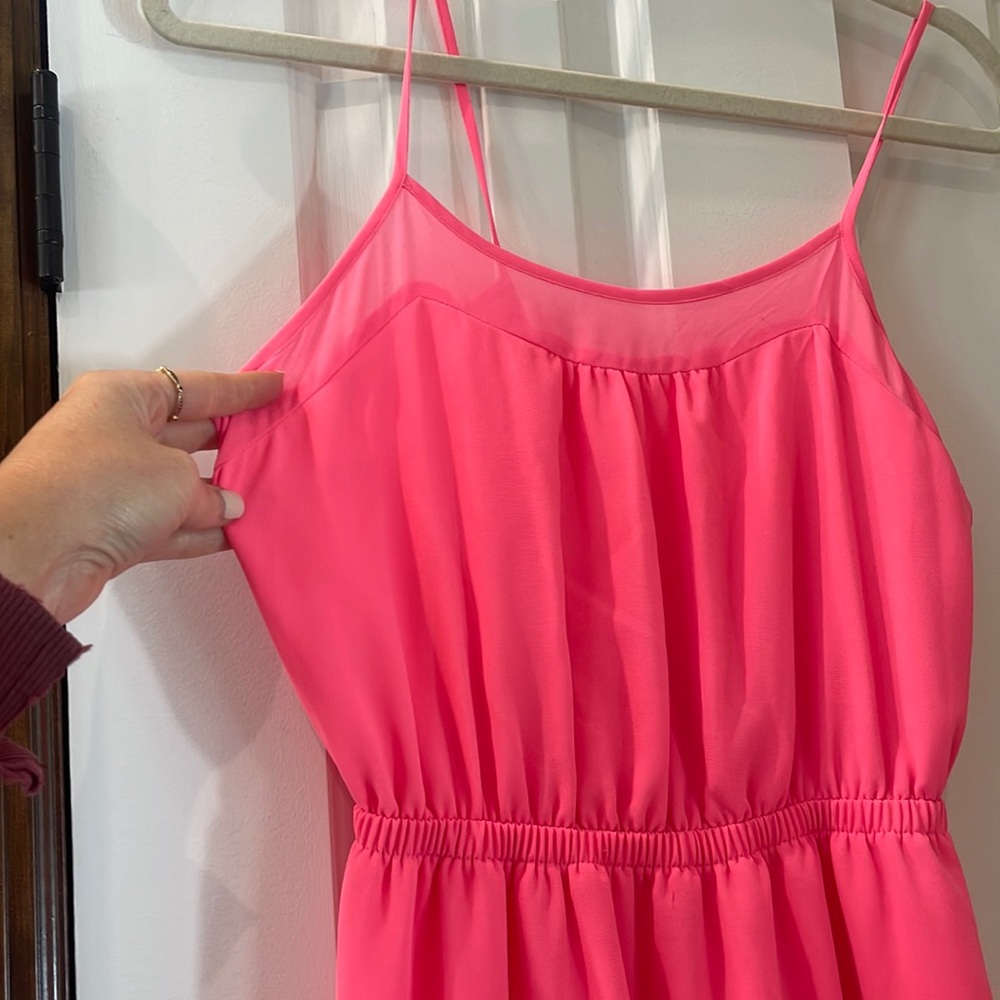 Neon pink maxi dress with a sheer mesh at neckline
